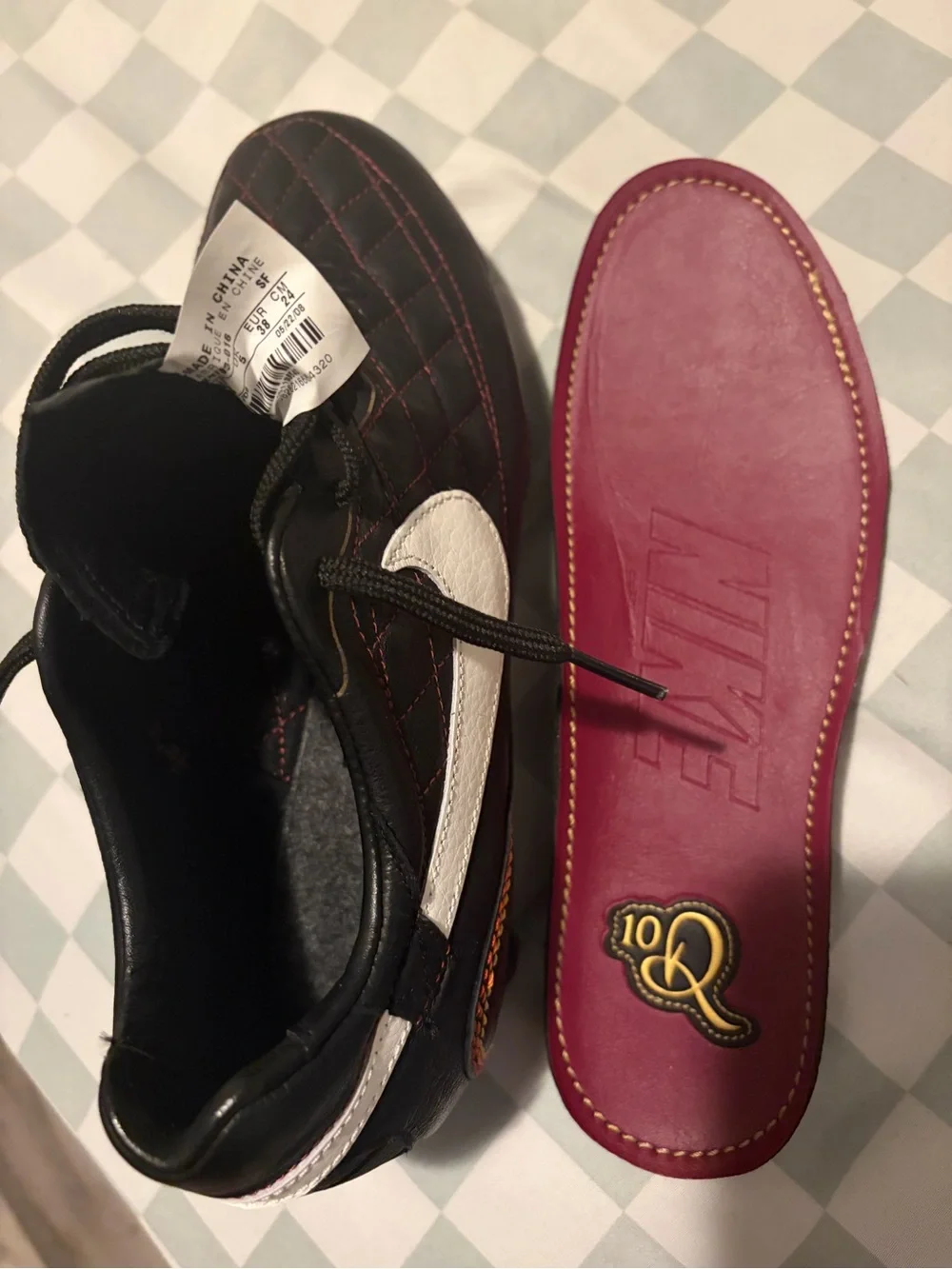 Nike Men’s Black Athletic Shoes with White Swoosh and Yellow/Red Insole